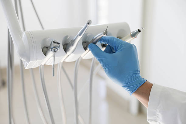 Professional Emergency Dentist technician working in Gladstone, MI
